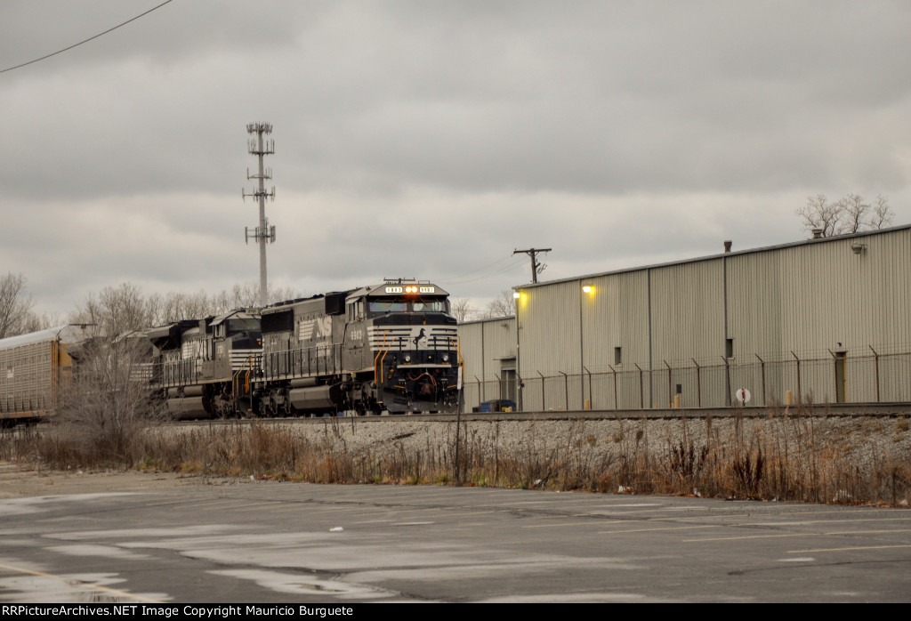 NS SD60E Locomotive leading a train